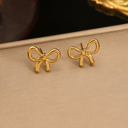 Auravelle Polished Bow Earrings – A Touch of Playful Elegance