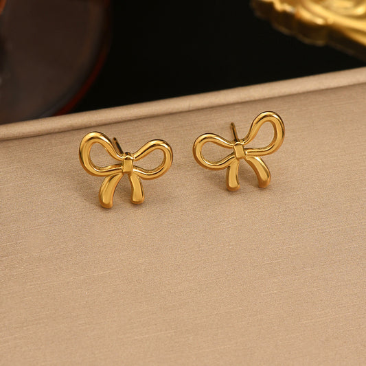 Auravelle Polished Bow Earrings – A Touch of Playful Elegance